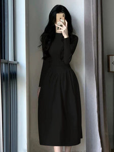 Knitted summer dress with mock neck and slim waist, mid-length with coat