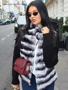 Stylish women’s faux fur cropped coat with collar, winter 2025